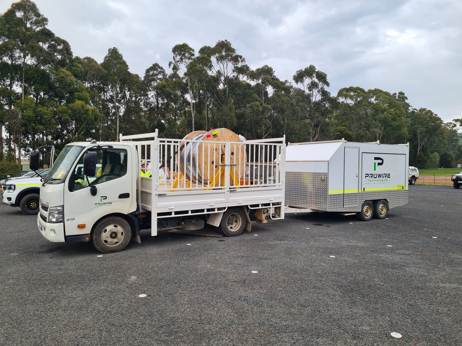 Hino 300 cable truck towing the Prowire trailer